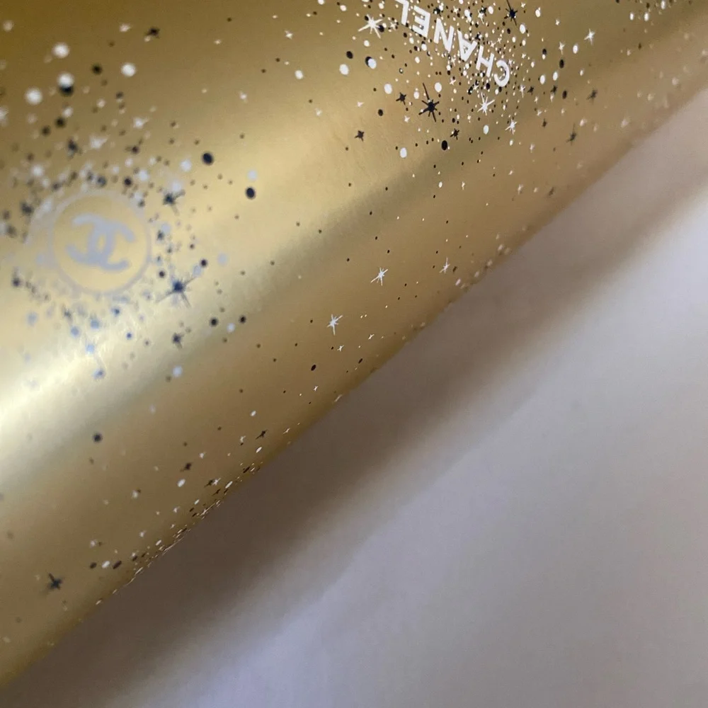 Boxes & 9’ Roll CHANEL Gold and White Star Luxury Gift Wrap